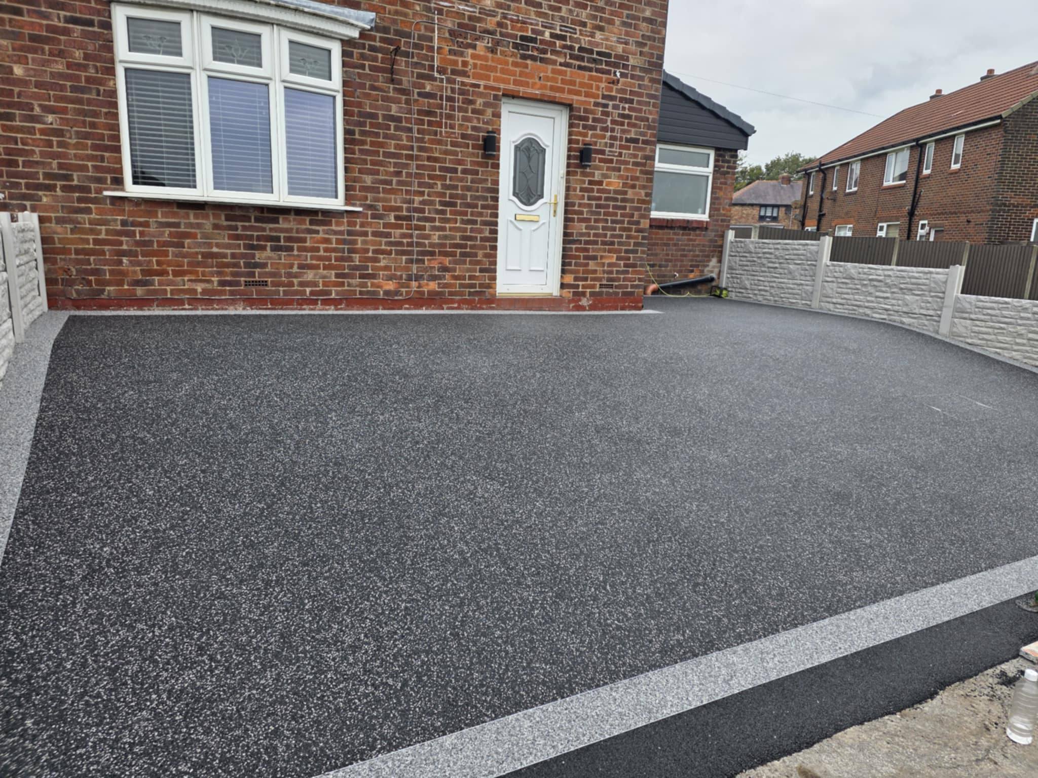 Polaris resin driveway with marble border in Norley Hall Wigan